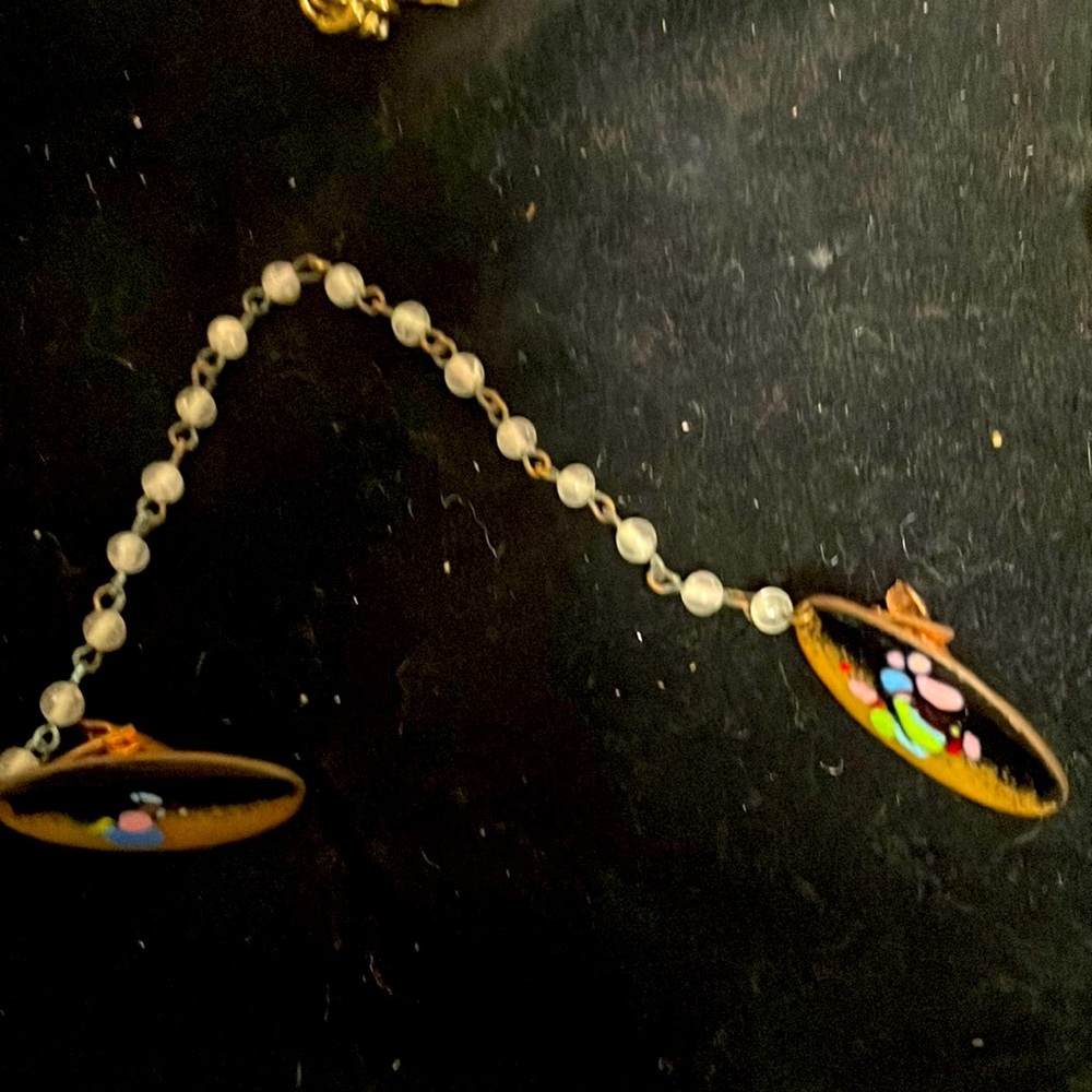 Vintage sweater clips, hand painted with beads on chain.